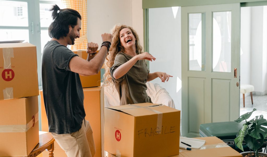 couple unpacking couple unpacking